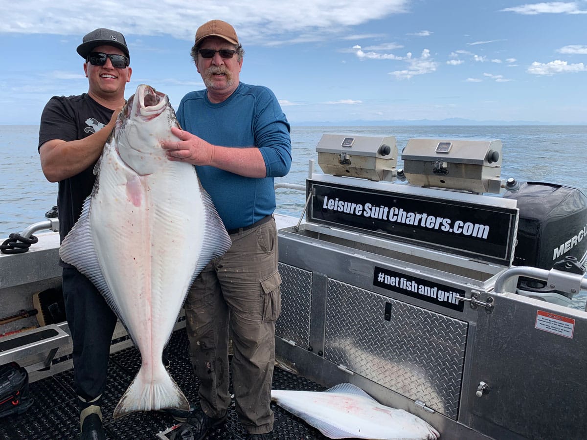 Larry Weber with a charter guest